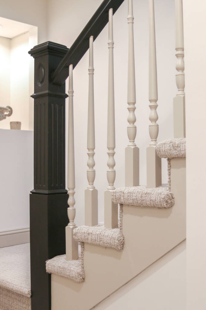 Finished Naperville basement remodel soft family-friendly carpet on stairs.