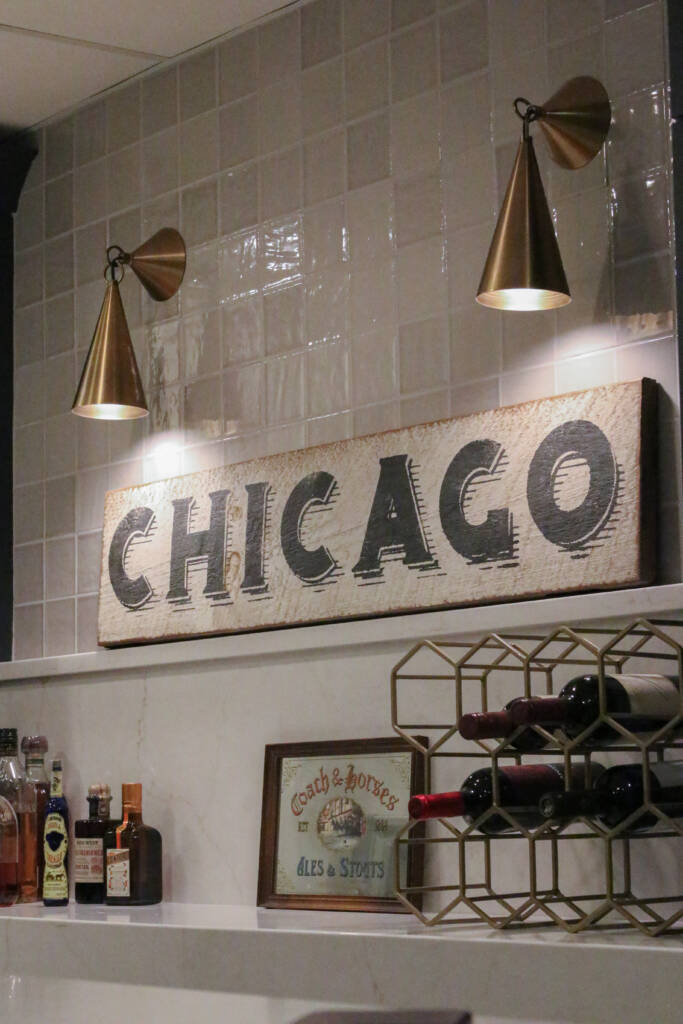 Finished basement remodel with custom bar seating, brass hardware, MSI Valentine countertop.