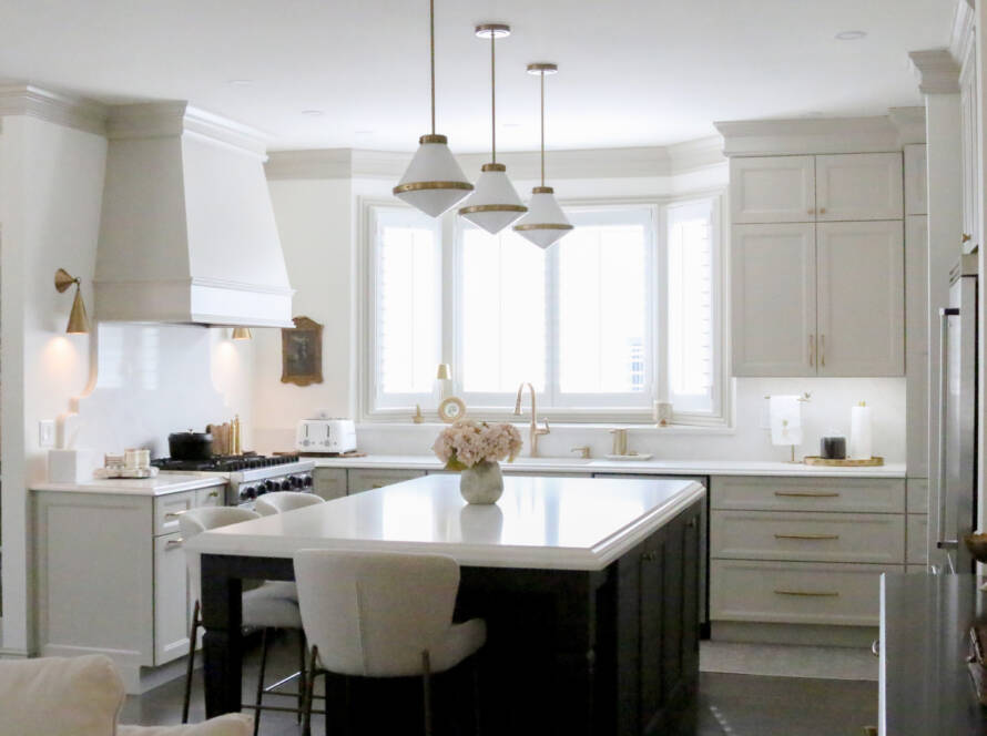 Completed kitchen remodel with custom cabinetry, msi valentine countertops, island seating, and refinished hardwood floors.