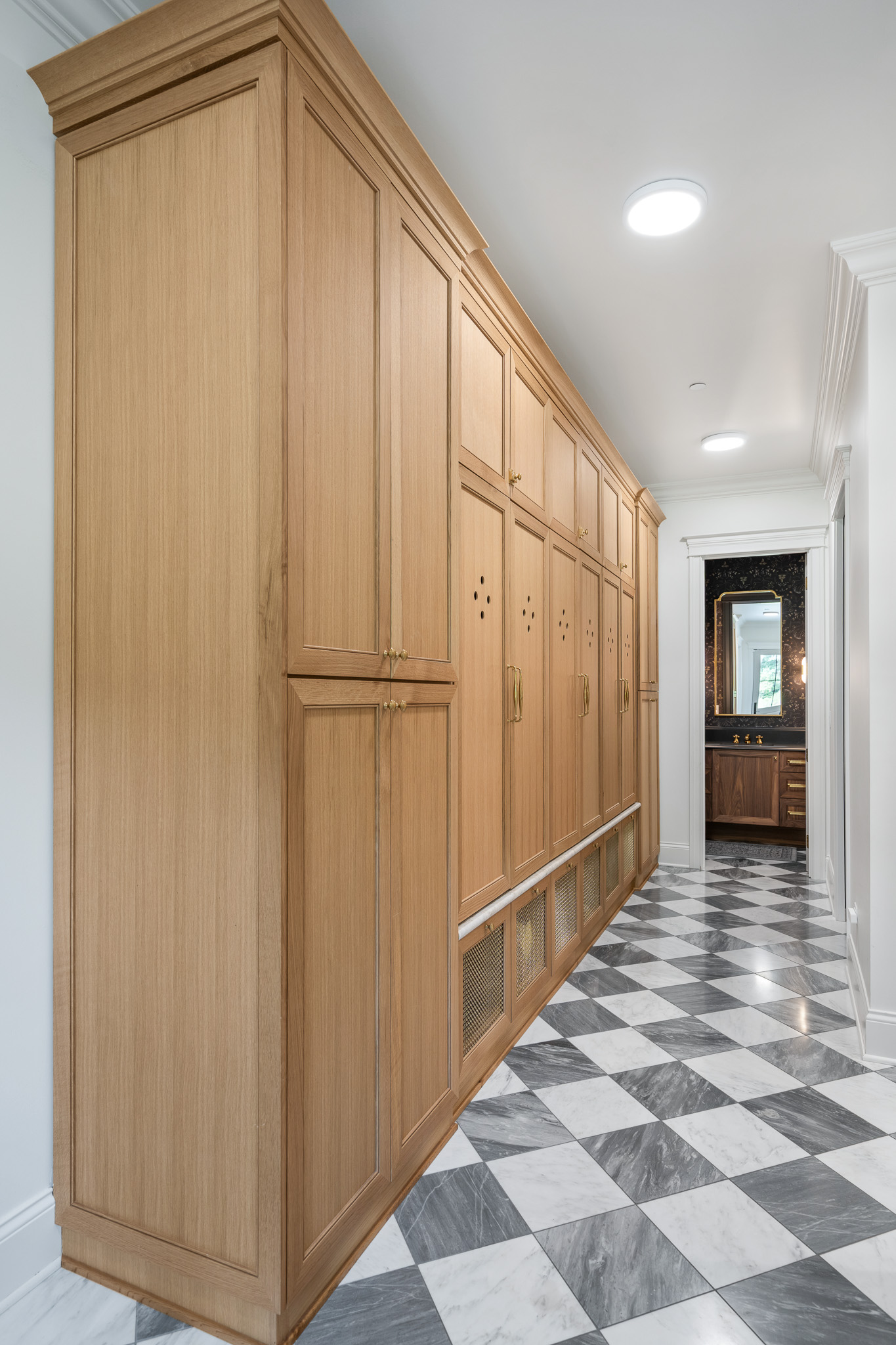 Large family mudroom with pattern tile