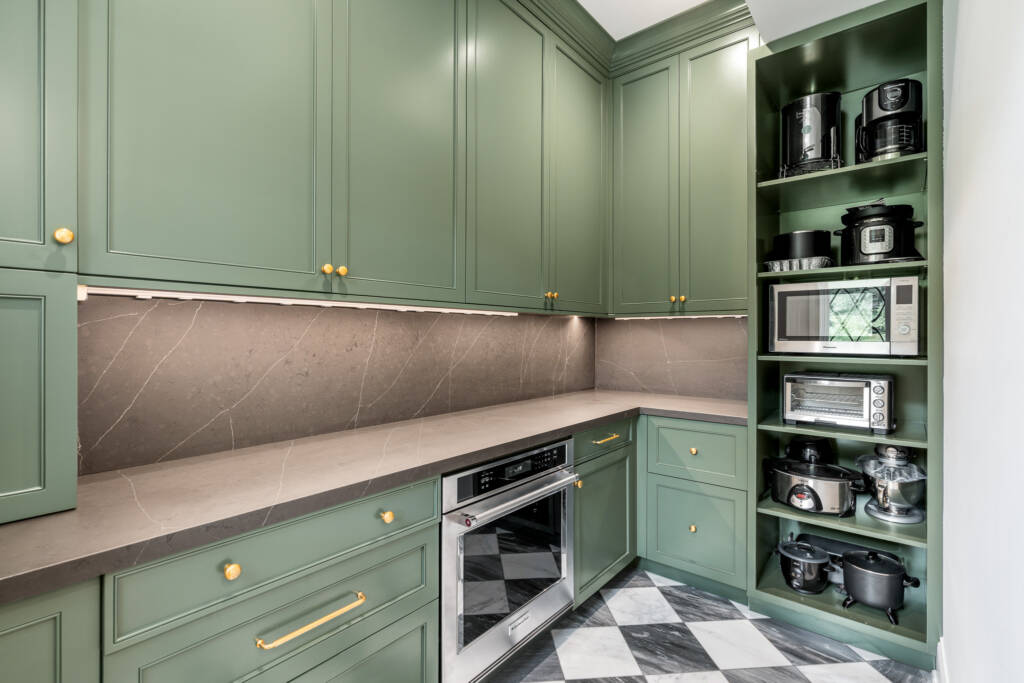 Scullery auxiliary kitchen with green cabinets