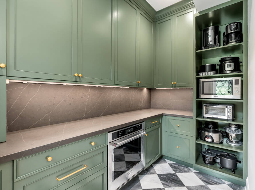 Scullery auxiliary kitchen with green cabinets