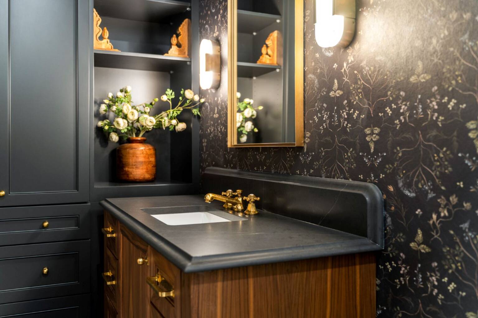 Dark moody powder room bathroom with wallpaper