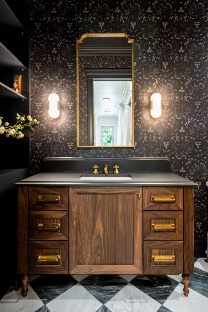 Dark moody powder room bathroom with wallpaper