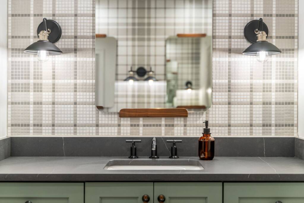 Kids bathroom green vanity and triple sink