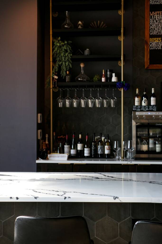 Oswego oak and bean - quartz bar countertops and tilework